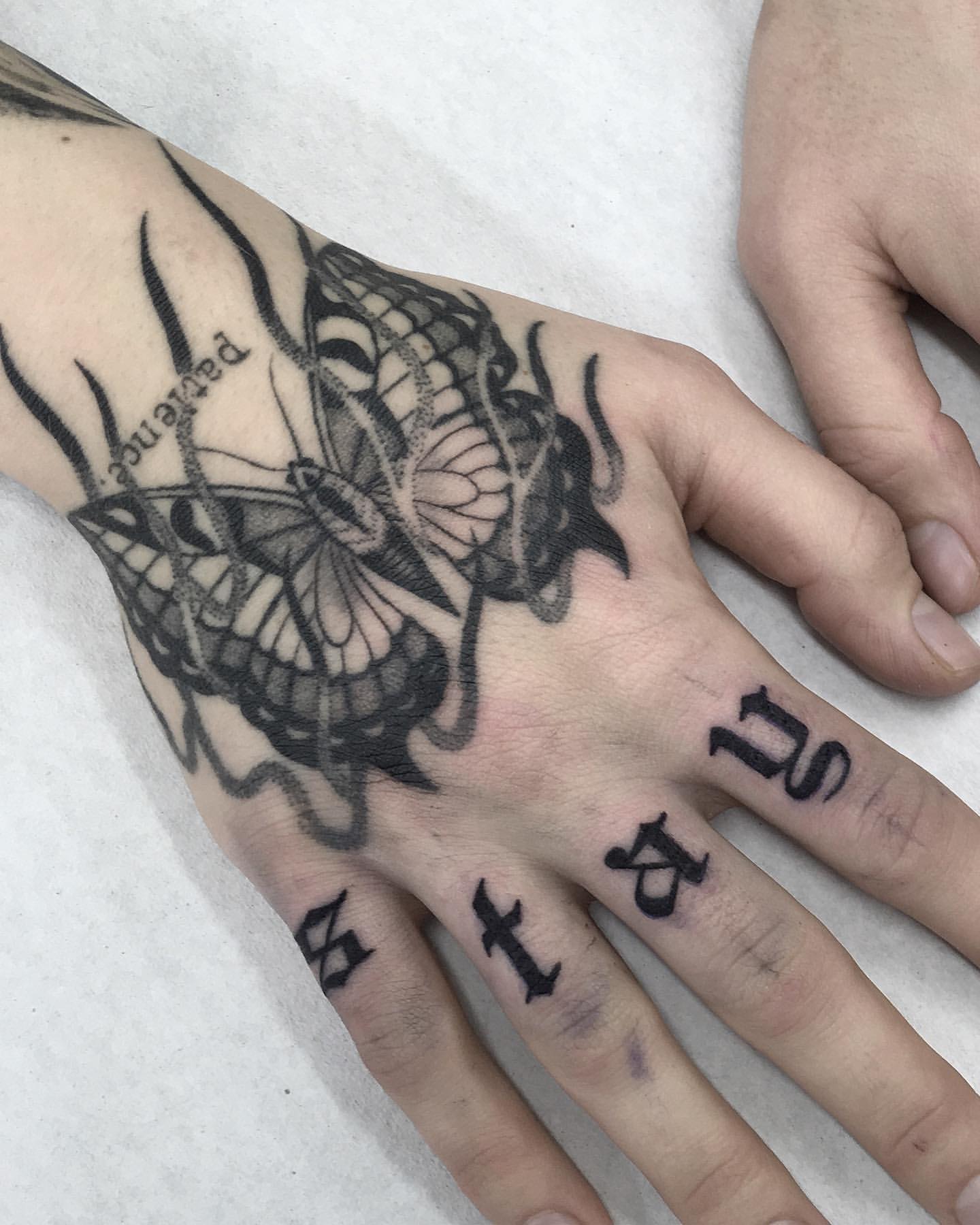 Butterfly Hand Tattoo Ideas 9