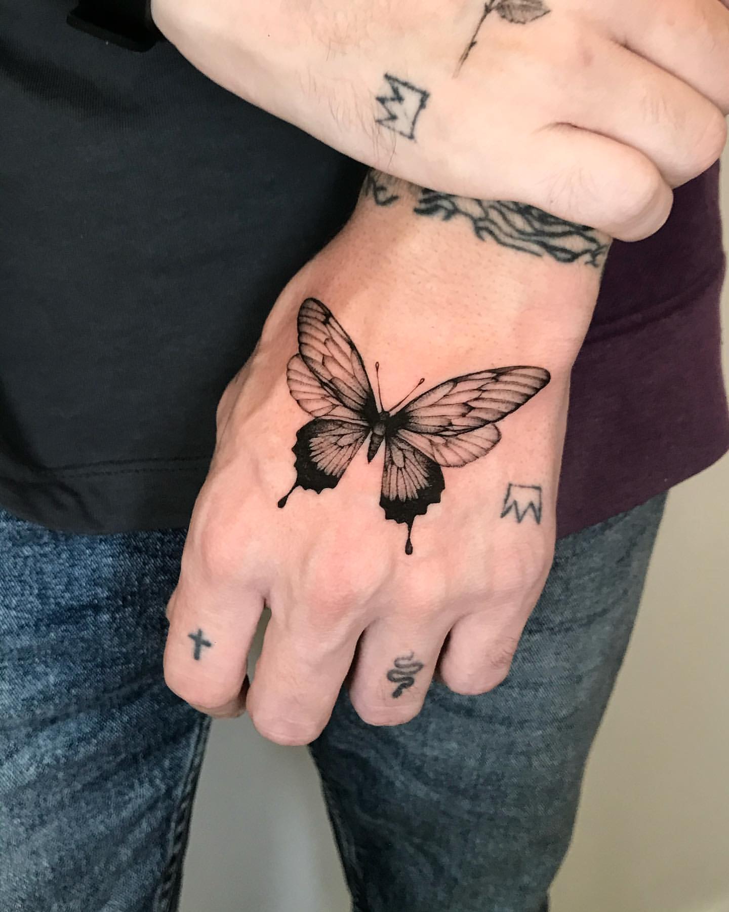 30 Awesome Butterfly Hand Tattoo Ideas for Men & Women in 2023