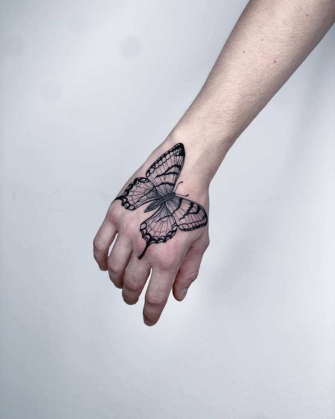 Butterfly Hand Tattoo Ideas 17