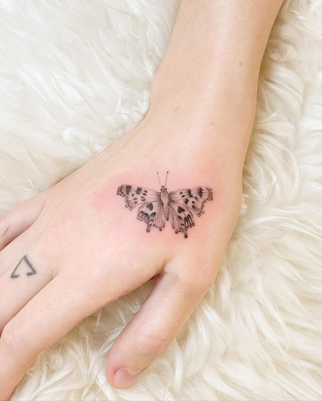Butterfly Hand Tattoo Ideas 20