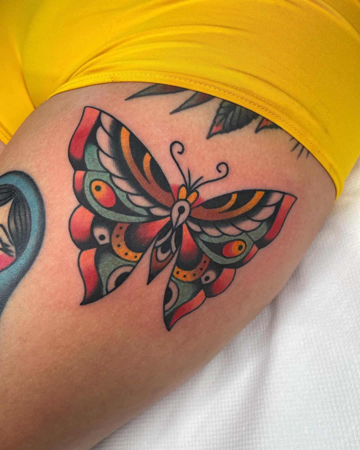 Butterfly Thigh Tattoo Ideas 19