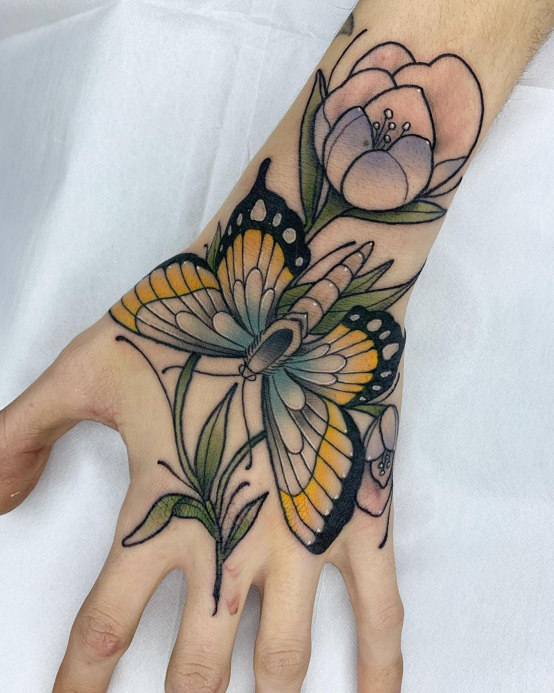 Butterfly Hand Tattoo Ideas 31