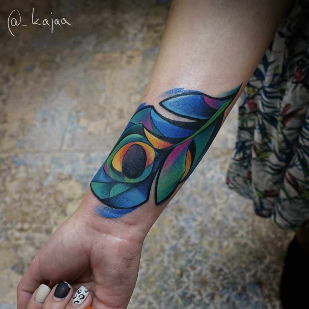 14 Beautiful Peacock Feather Tattoo Ideas for Women in 2024