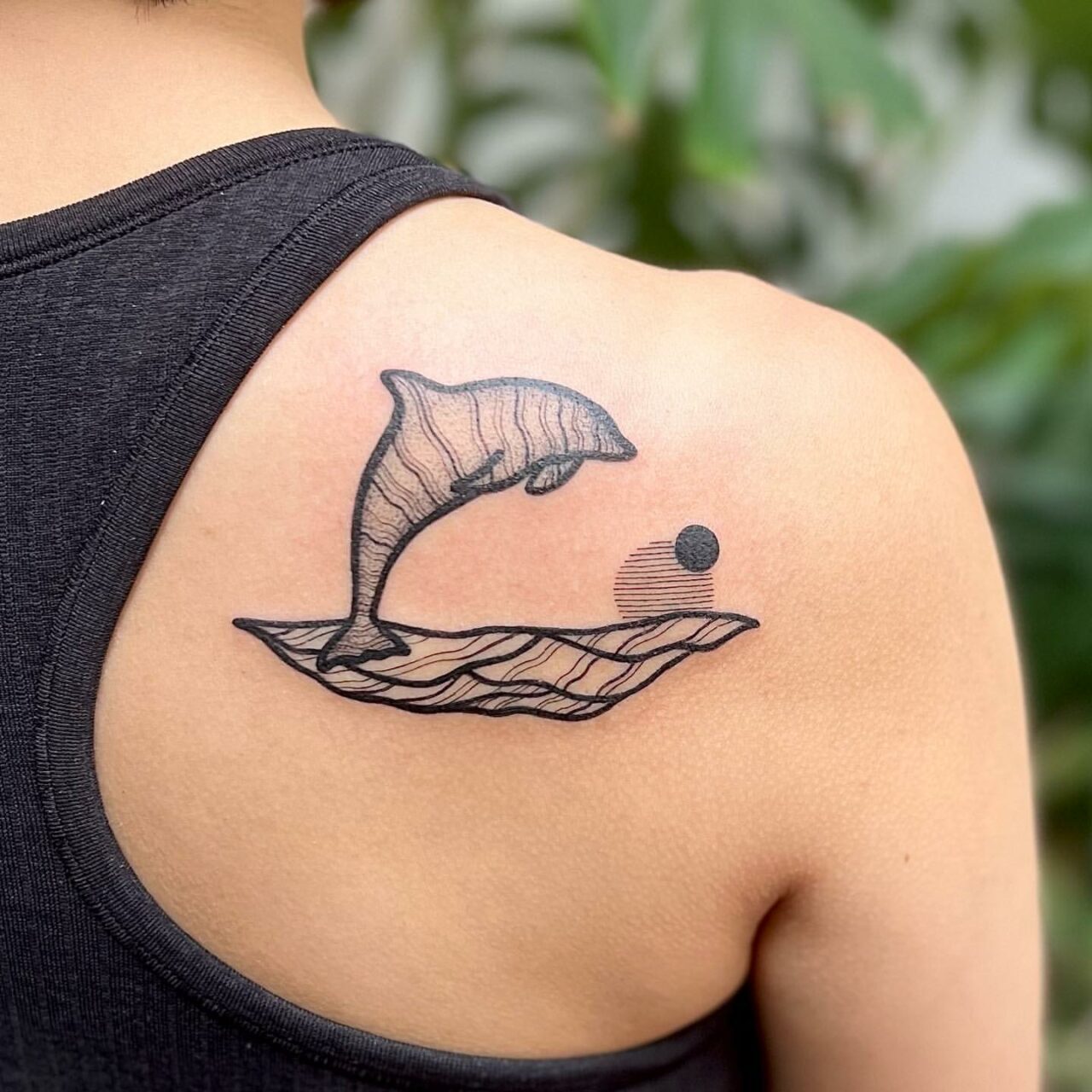 30 Delightful Dolphin Tattoo Ideas for Men & Women in 2024